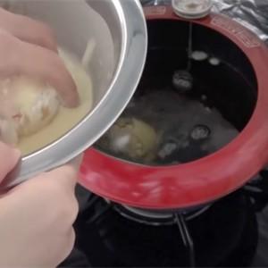 Roll the eggs through the mixture of tempura flour and water