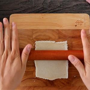 roll the sandwich into a thin layer