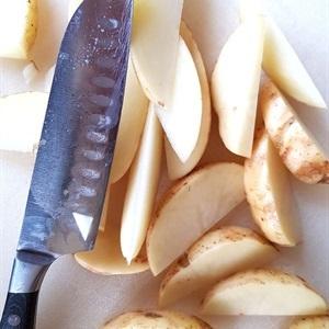Wash the potatoes and peel them