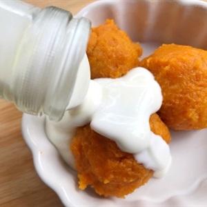 add yogurt into the bowl of sweet potato