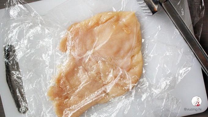 wrap chicken breast with nylon and beat it