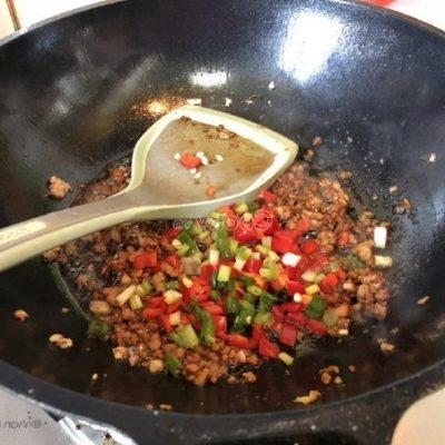 add green onion and chili to stir-fry