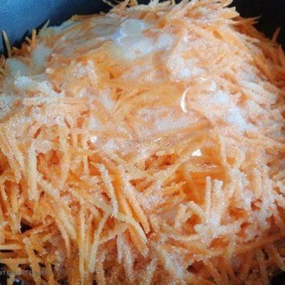 mix carrot with sugar and orange peel