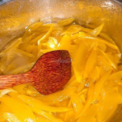 cook mangoes pieces with the mixture of alum